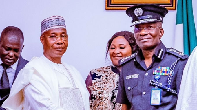 IGP Egbetokun (right)