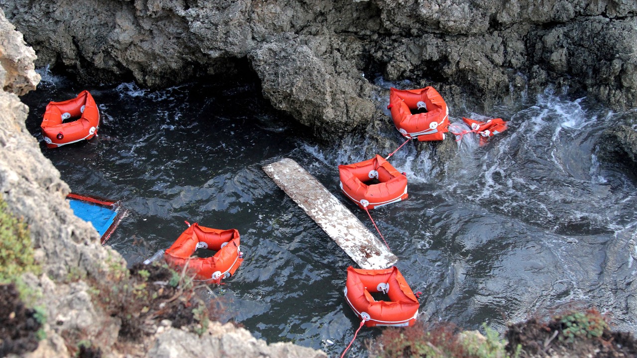 Flotation devices are seen in the area where a migrant boat capsized off the Italian coast, on the island of Lampedusa, Italy. /Mauro Buccarello/File Photo/Reuters