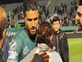 31-year-old footballer suspended for hugging female fan