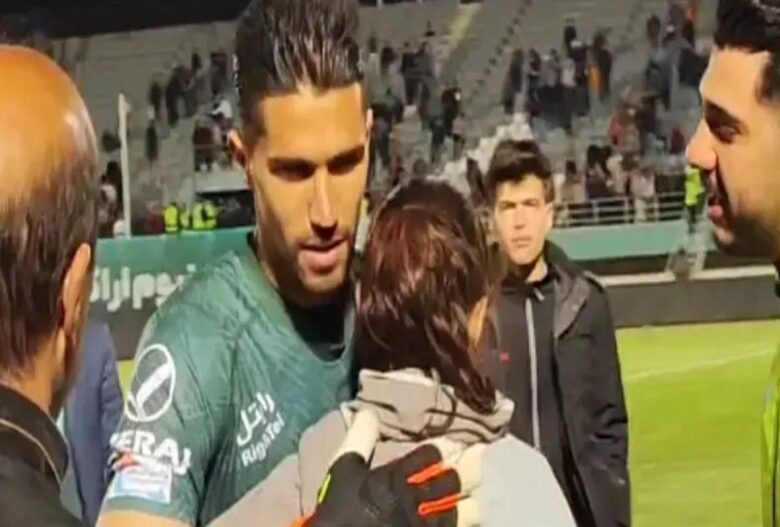 31-year-old footballer suspended for hugging female fan