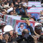 Thousands march as Iran prepares to bury late President Raisi