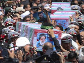 Thousands march as Iran prepares to bury late President Raisi