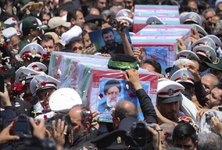 Thousands march as Iran prepares to bury late President Raisi