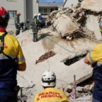 South Africa building collapse as more bodies found by crews