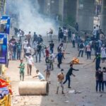 Bangladesh bans rallies after internet blackout buildings razed