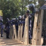 Ugandan security forces detain youths at banned anti-government rally in Kampala