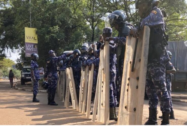 Ugandan security forces detain youths at banned anti-government rally in Kampala